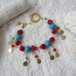 Muse Bracelet Gold Coral Turquoise Dancing Dangles..